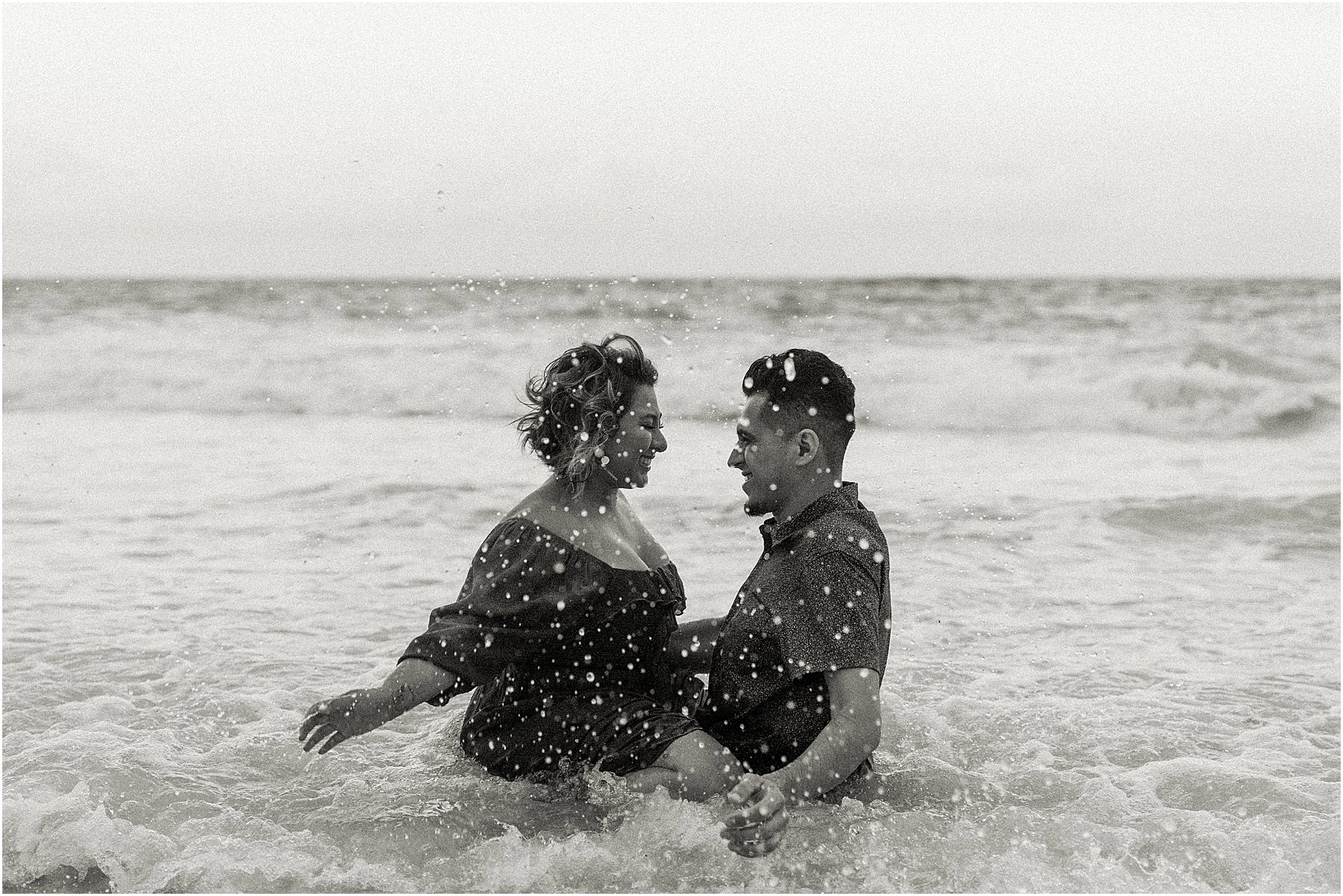 couple playing in the water