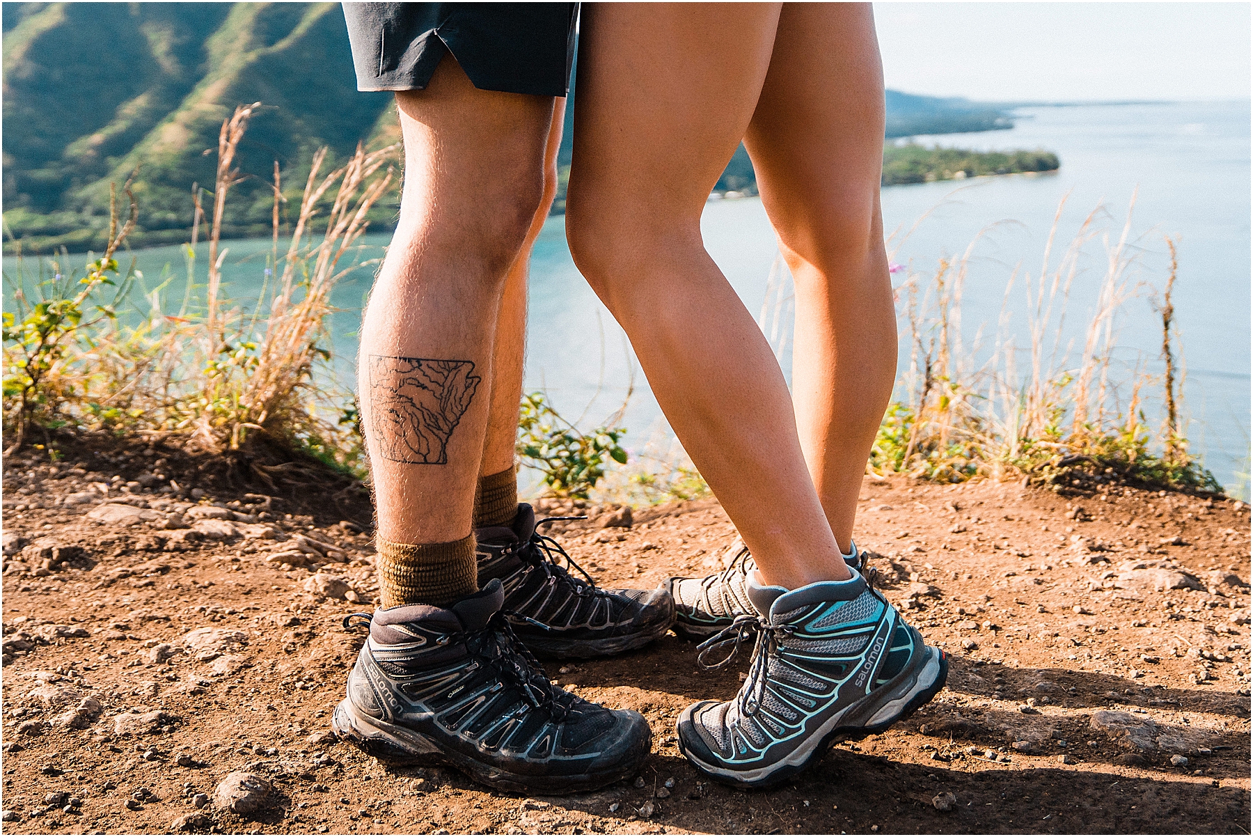 couple wearing hiking boots for engagement session