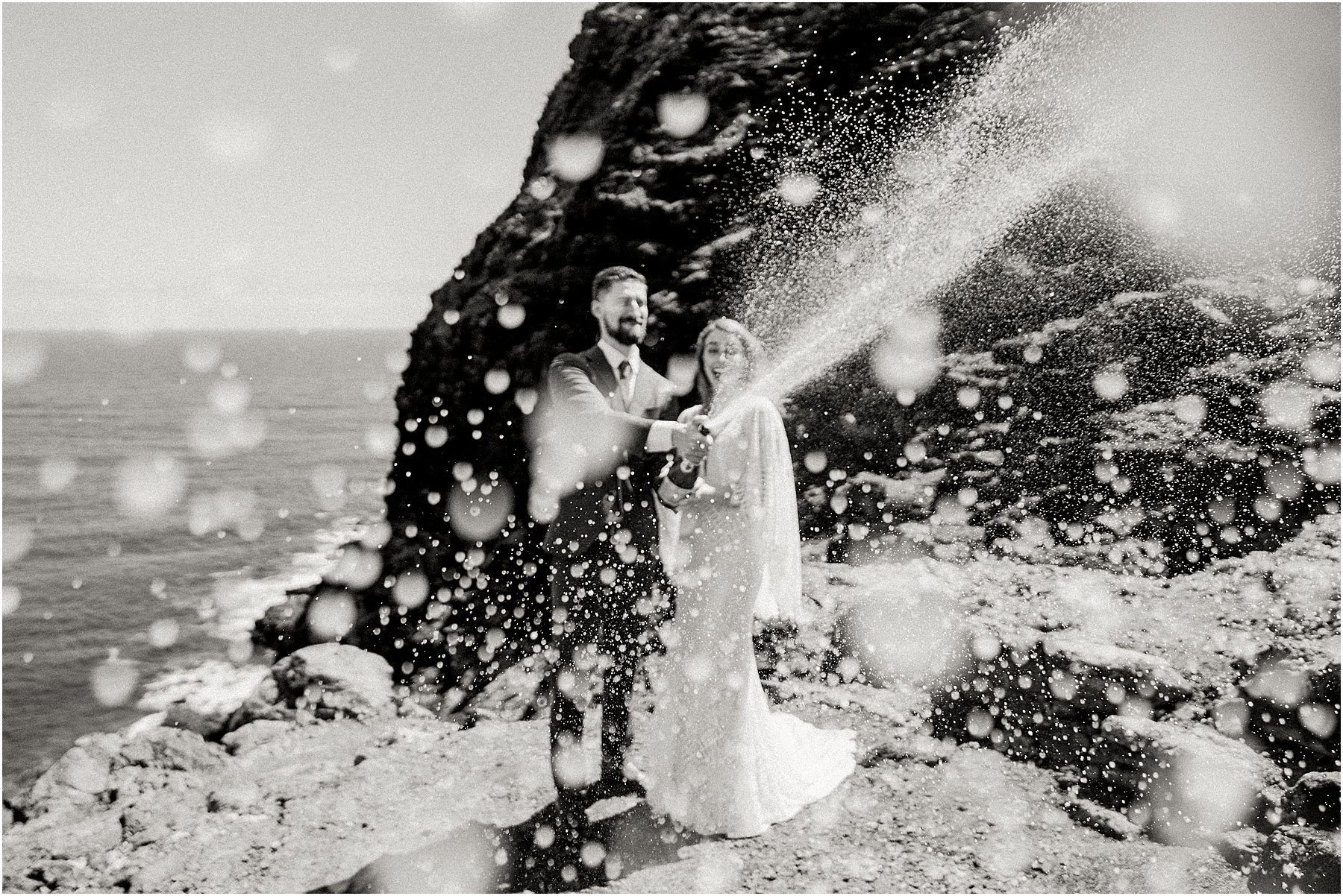 adventure elopement couple popping champagne