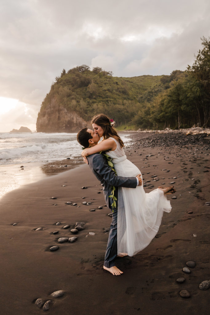pololu valley elopement bride and groom kissing
