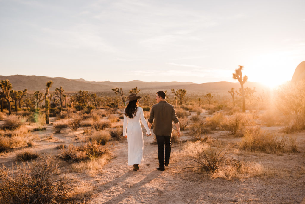 Engagement pictures walking in Joshua Tree National Park