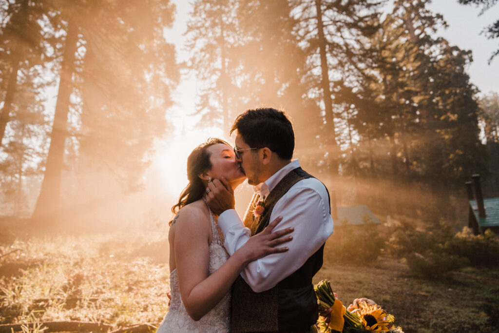 bride and groom kissing at sunrise during their kings canyon and sequoia national park elopement