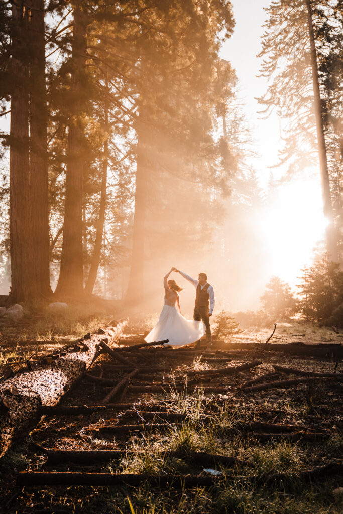 wedding couple dancing at sunrise in Sequioa national park