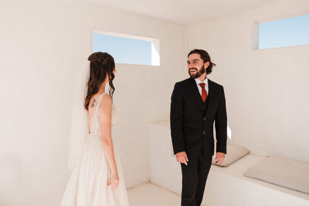 joshua tree airbnb wedding first look with bride and groom